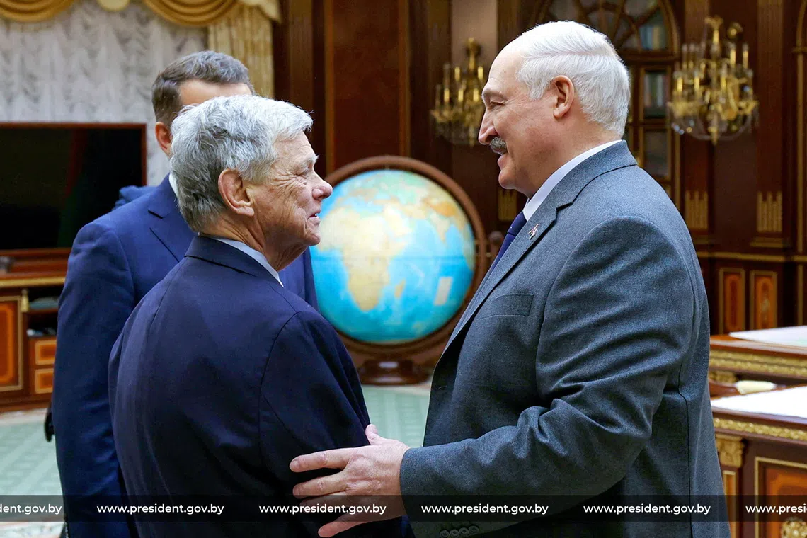 Belarusian President Alexander Lukashenko attends a meeting with John Coale, a representative of U.S. President Donald Trump, in Minsk, Belarus December 12, 2025. President of the Republic of Belarus/Handout via REUTERS