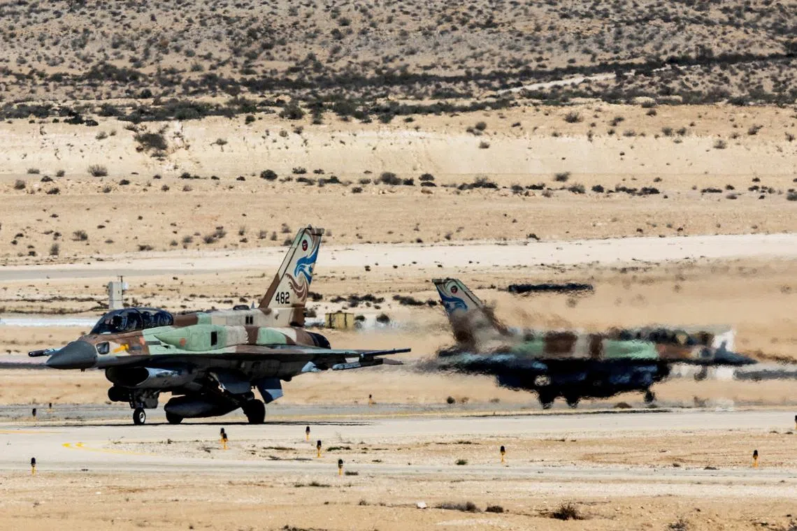 FILE PHOTO: A view shows Israeli F-16 fighter jets on a runway in an airbase in southern Israel, March 4, 2024. REUTERS/Ronen Zvulun/File Photo