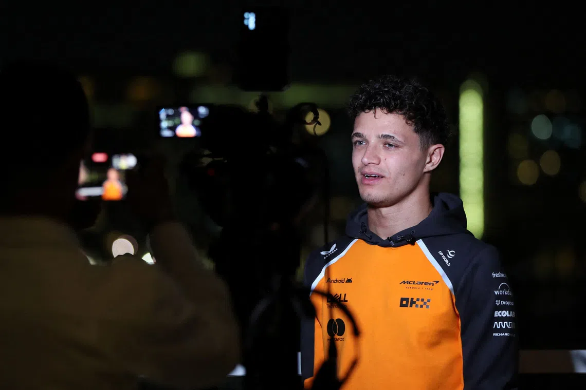 McLaren's Lando Norris is interviewed the day after becoming the 2025 Formula One World Champion in Abu Dhabi, United Arab Emirates, December 8, 2025. REUTERS/Satish Kumar