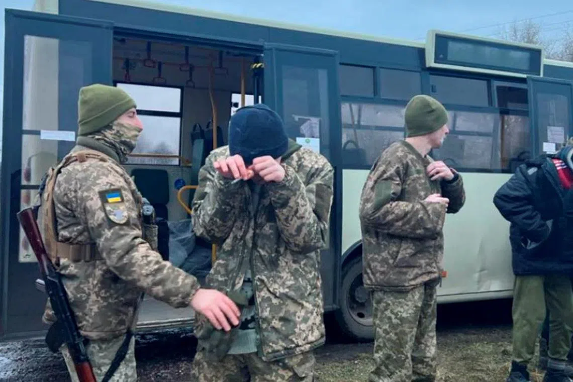 A Ukrainian prisoner of war reacts during the swop, in an unknown location in Ukraine, on Dec 31, 2022.