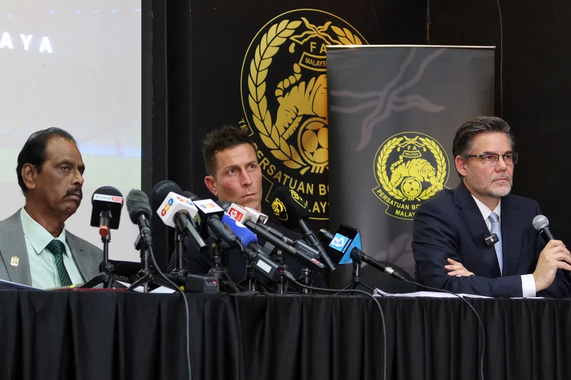 Football Association of Malaysia (FAM) Vice President S. Sivasundram, Malaysian national team Chief Executive Officer Rob Friend, and FAM legal counsel Serge Vittoz hold a press conference regarding the suspension of seven of Malaysia's naturalised players by FIFA over the alleged use of forged documents to represent the country at Petaling Jaya, Malaysia, October 17, 2025. REUTERS/Mandy Leong Huey Mun