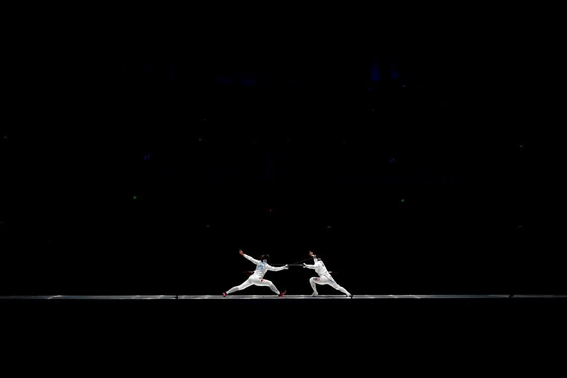 South Korea's Kong Yong Mi competing against Hong Kong's Hsieh Kaylin Sin Yan (L) in the women's epee team finals fencing event during the 2022 Asian Games in Hangzhou on Sept 27.