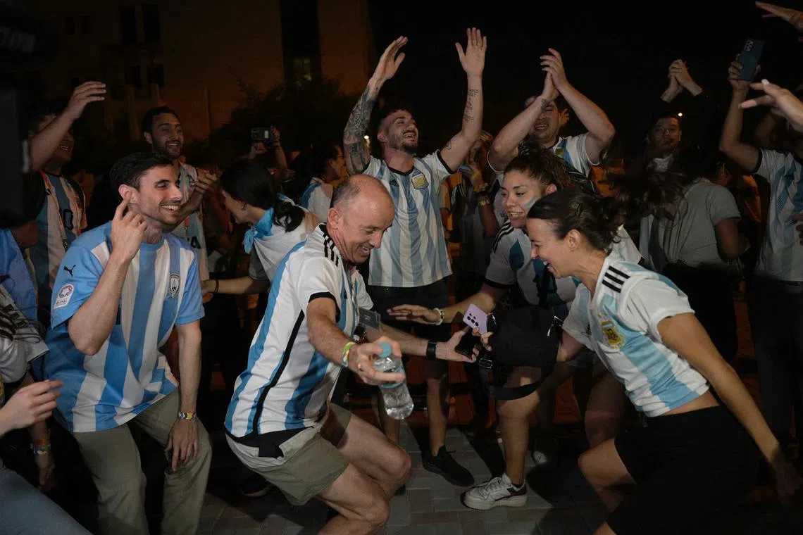 Argentina fans waiting for the arrival of Argentina’s football team outside of their base camp in Doha on Thursday ahead of the Qatar World Cup.