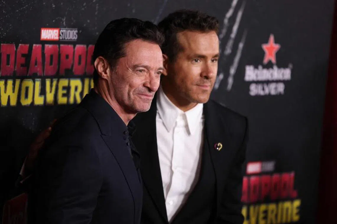 Australian actor Hugh Jackman (left) and Canadian-American actor Ryan Reynolds (right) attend the Deadpool & Wolverine premiere at David H. Koch Theater in New York City on July 22, 2024.