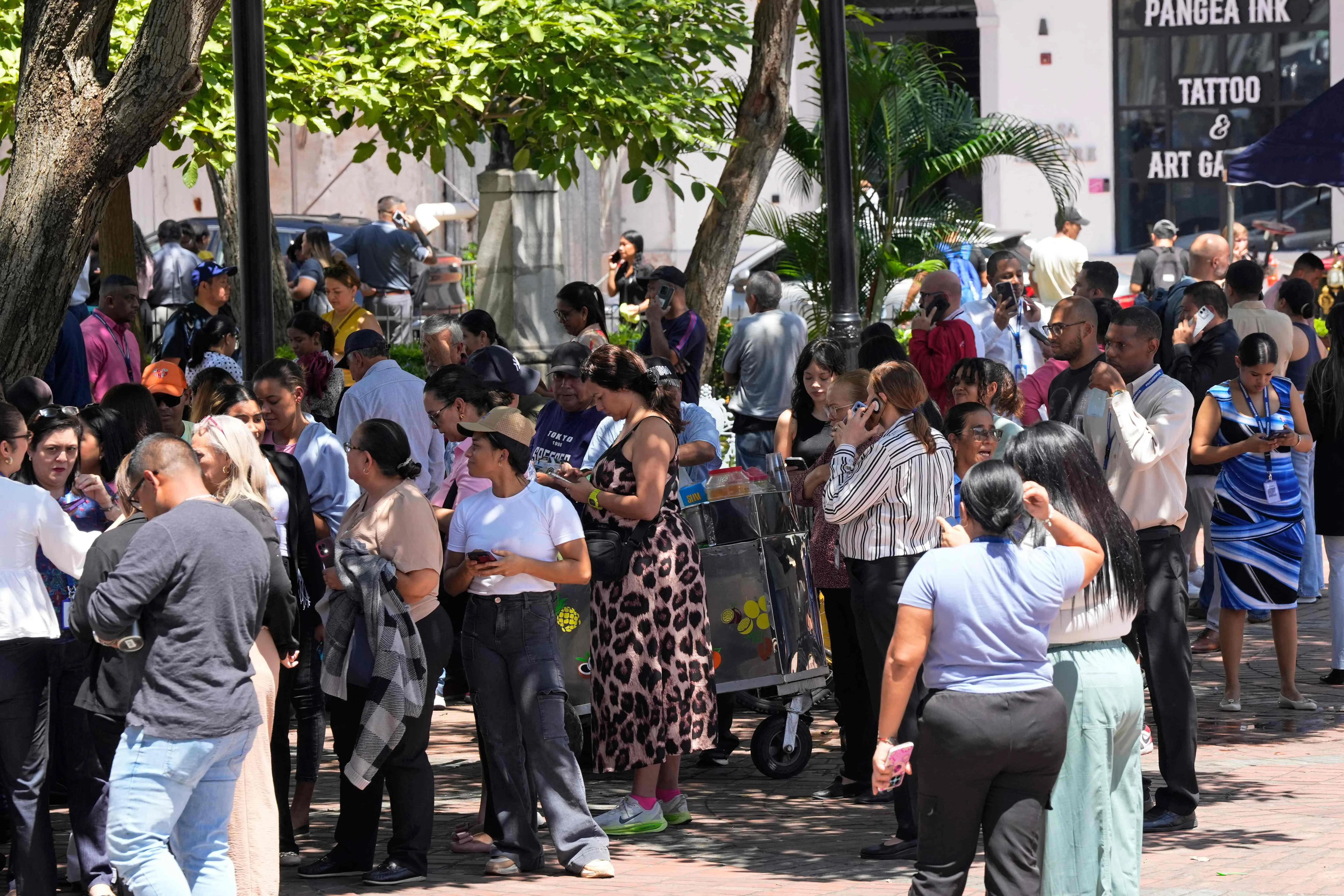 People evacuated from a building in Panama City on Oct 9, after Panama was struck by a 7.7 magnitude earthquake.