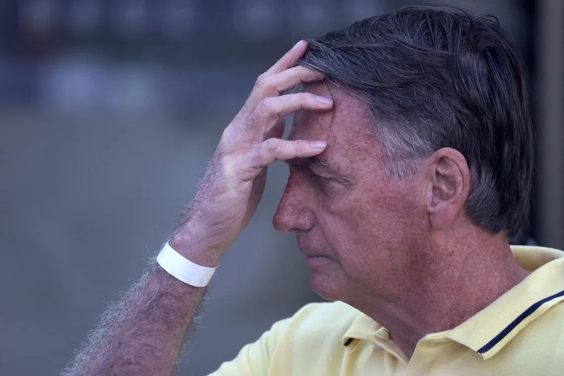 FILE PHOTO: Brazil's former President Jair Bolsonaro leaves a hospital after undergoing medical examinations, authorised by Supreme Court Justice Alexandre de Moraes in Brasilia, Brazil, August 16, 2025. REUTERS/Adriano Machado/File Photo