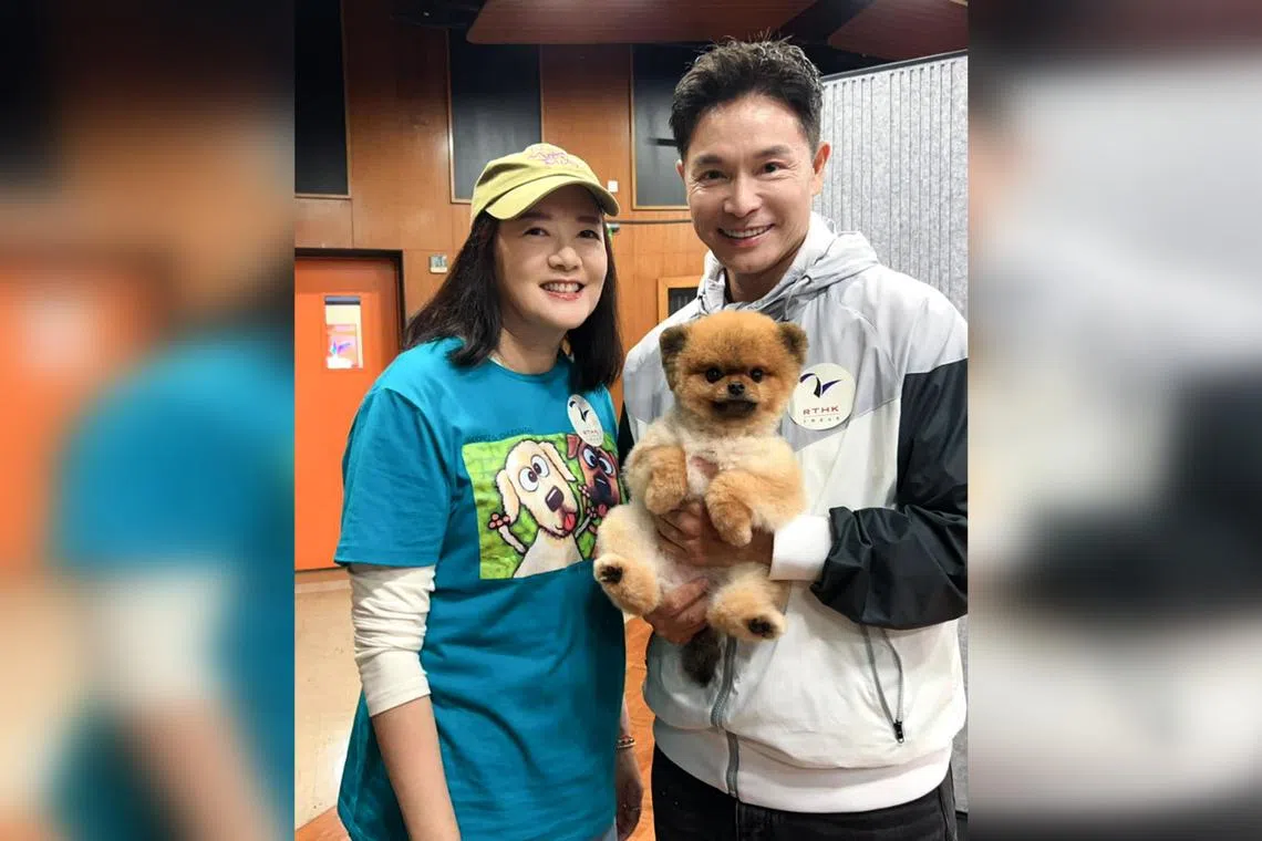 Roger Kwok (right) with radio host Lau Sin Yee, host of RTHK's new show Tail With Love. 