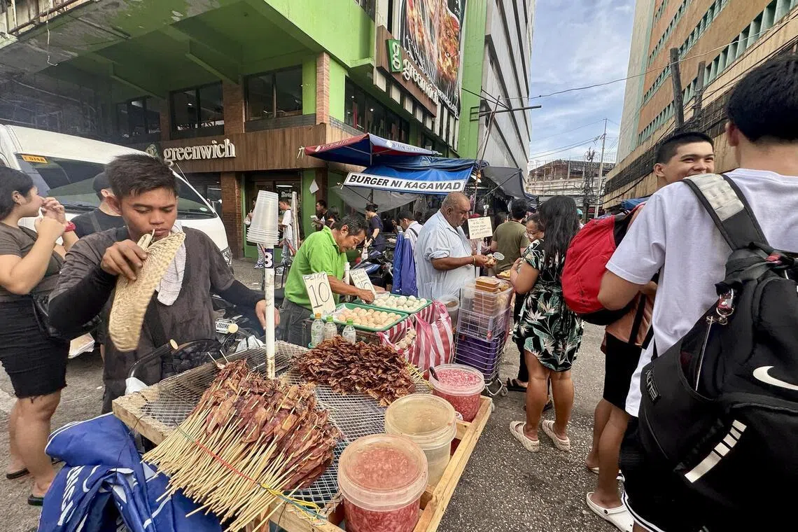 Middle East war takes a bite out of Filipino street food vendors