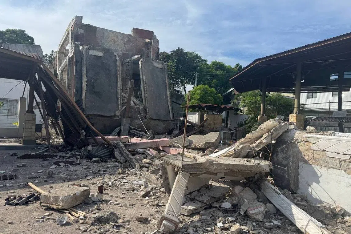 The destroyed dormitory and function hall of St Vincent Ferrer Parish in Bogo City, Cebu, seen on Oct 2.