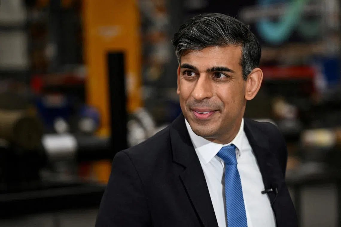 FILE PHOTO: Britain's Prime Minister Rishi Sunak reacts as he speaks during an interview following a visit in the Siemens Mobility factory, in Goole, in East Yorkshire, Britain February 26, 2024. Paul Ellis/Pool via REUTERS/File Photo