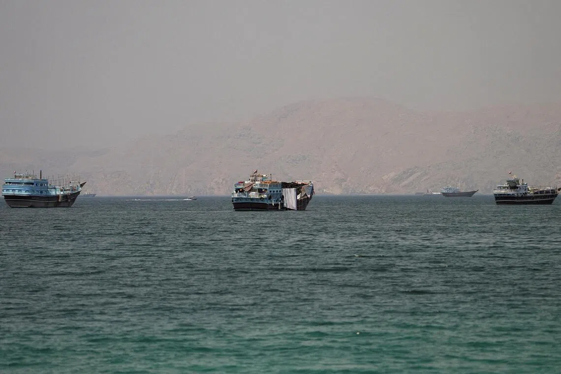 Vessels at the Strait of Hormuz, as seen from Musandam, Oman, on June 22