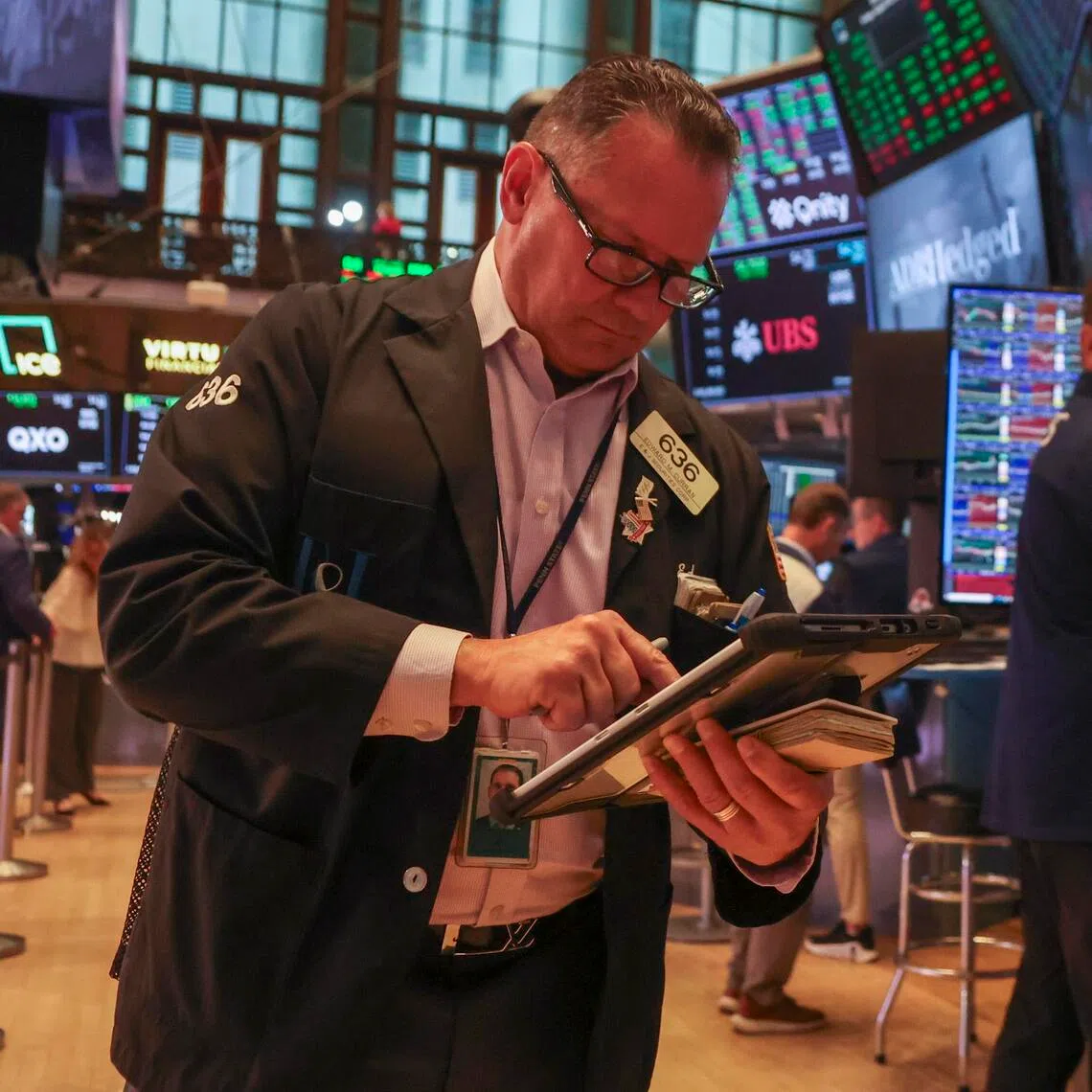 Traders working on the floor of the New York Stock Exchange, in New York City, on Aug 28.