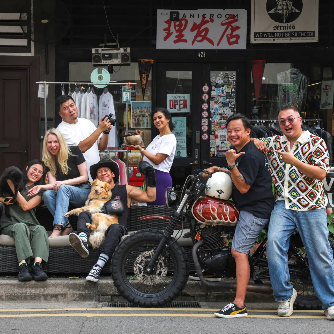 (From left) Dr Serena Shum, Meraki Vets; Hannah James, Head of Place-making, Katong-Joo Chiat Business Association; Edmund Sim, Twenty Blinks Studio; Danny Fleury, Spartans Boxing Club, (wearing cowboy hat); Archana Amlapure, Ojas Yoga & Wellness (holding the sound bowl); Benjamin Tan, Creo Customs (on the motorbike); and Edmond Wong, President, Katong-Joo Chiat Business Association.