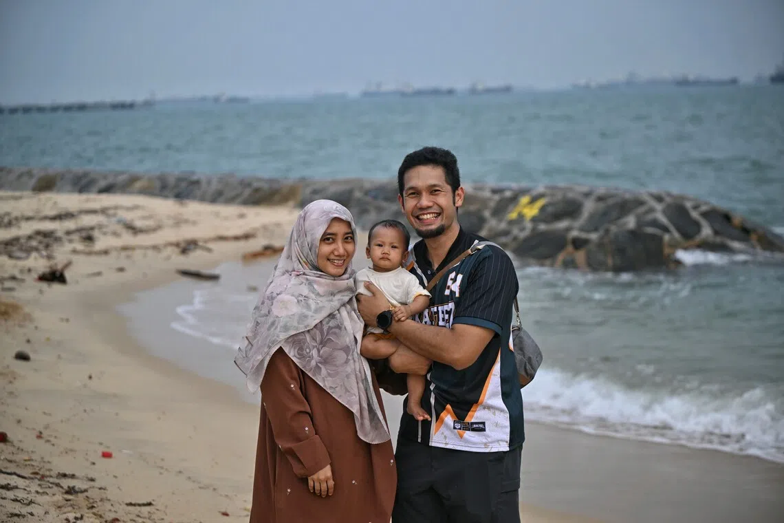 Mohammad Hafiq with his wife, Diyanah Mat Noor, and their kid, Mardhiah Mohammad Hafiq at East Coast Park on Sep 19.
