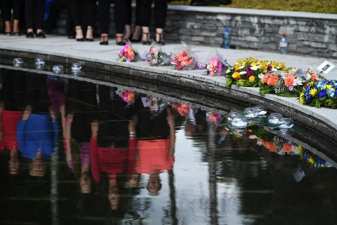 FILE PHOTO: Friends, relatives and victims commemorate the 20th anniversary of the IRA Omagh bombing at a ceremony in the Memorial Garden in Omagh, Northern Ireland August 12, 2018. REUTERS/Clodagh Kilcoyne/File Photo