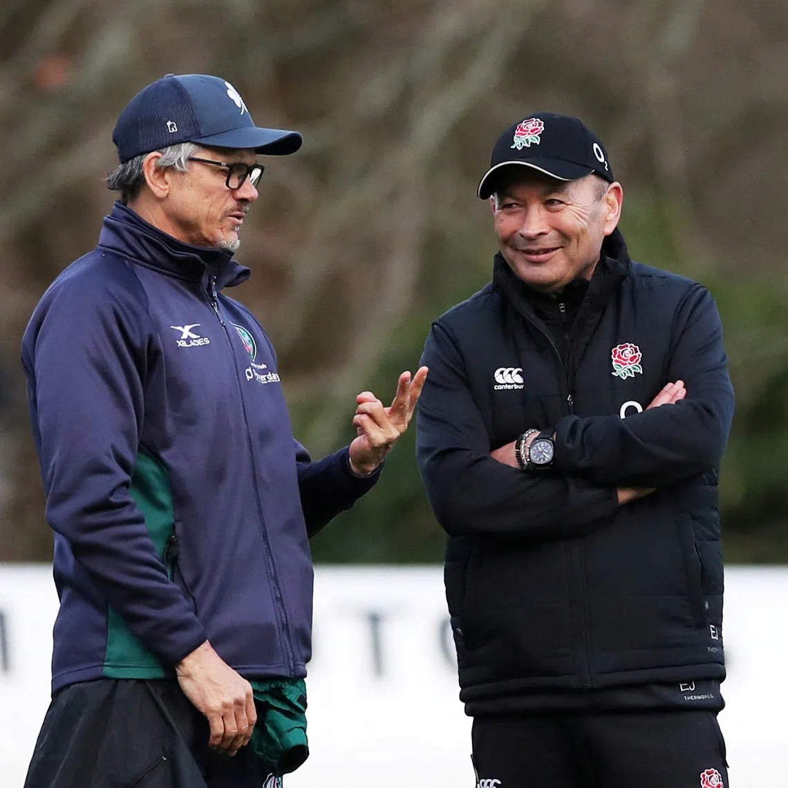 FILE PHOTO: Rugby Union - Six Nations Championship - England Training - Pennyhill Park Hotel, Bagshot, Britain - February 20, 2019   England head coach Eddie Jones with London Irish head coach Les Kiss during training   Action Images via Reuters/Peter Cziborra/File Photo