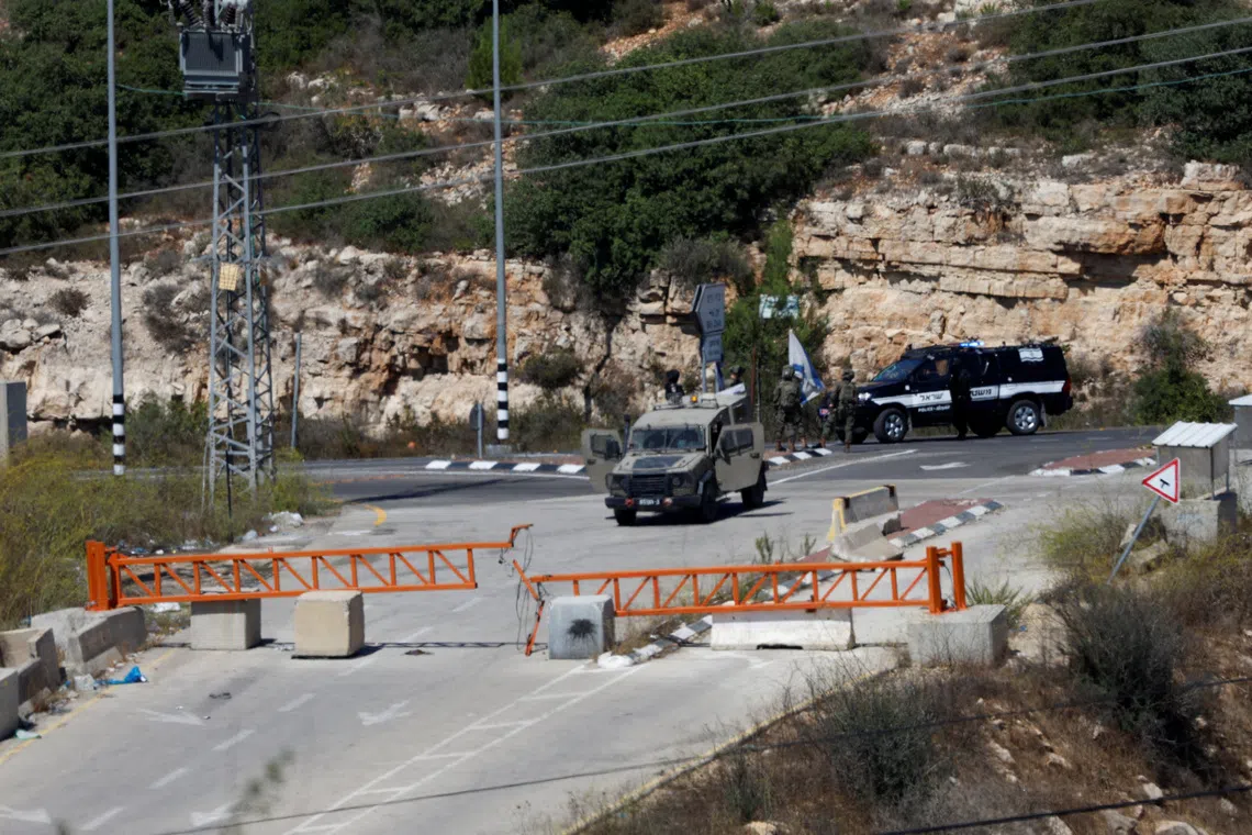 Palestinian gunman shoots dead Israeli in the West Bank, soldiers kill motorist