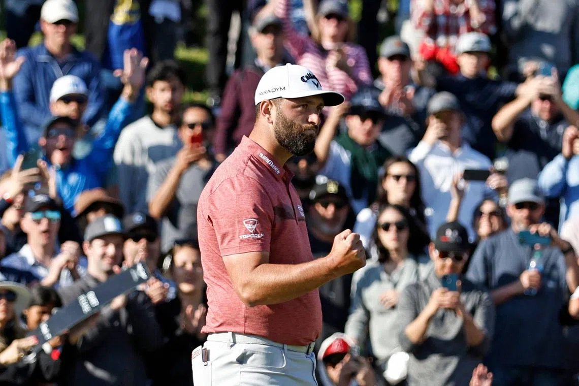 Jon Rahm of Spain celebrating on the 18th green after winning The Genesis Invitational at Riviera Country Club on Feb 19 in California.  