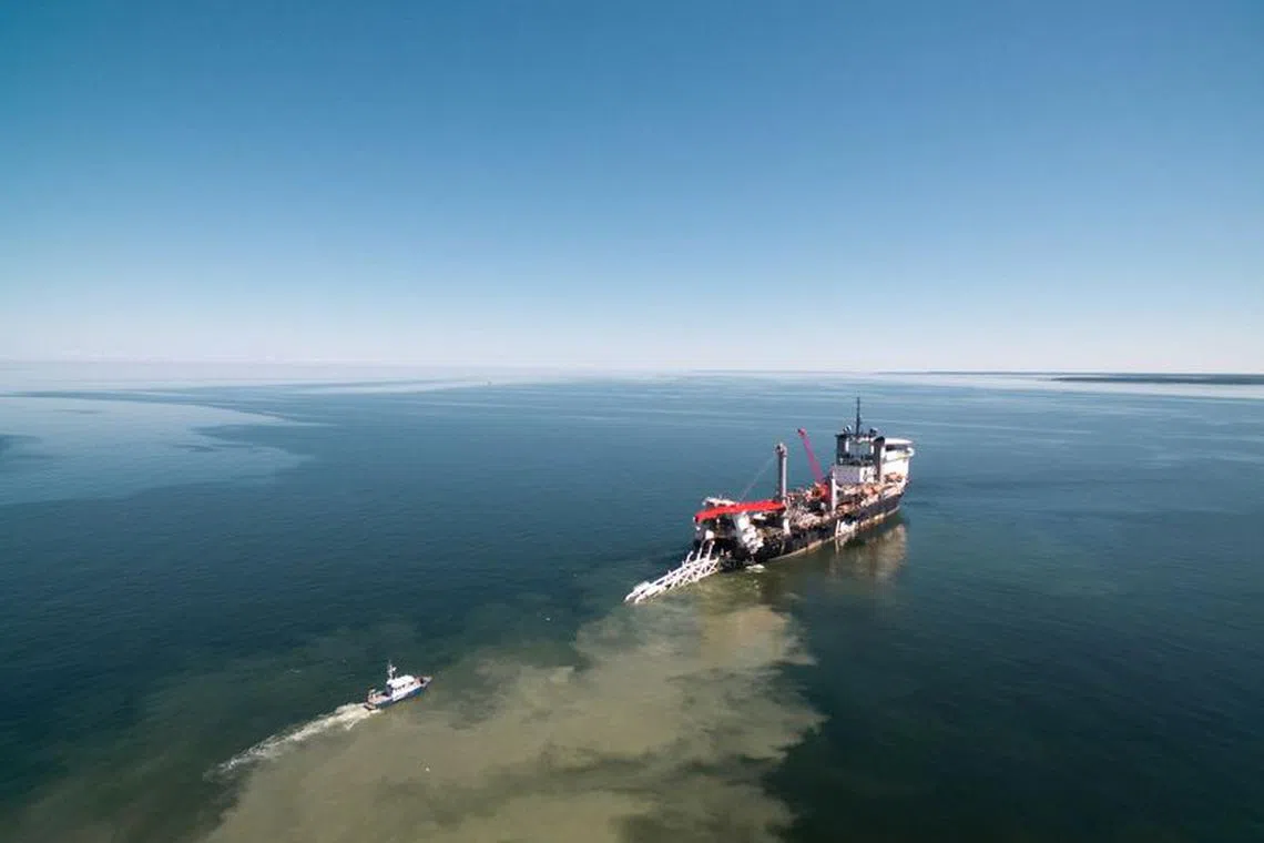 A view of the Balticconector pipeline as it is pulled into the sea in Paldiski, Estonia in an undated handout photo taken in 2019. ELERING/Handout via REUTERS/File Photo