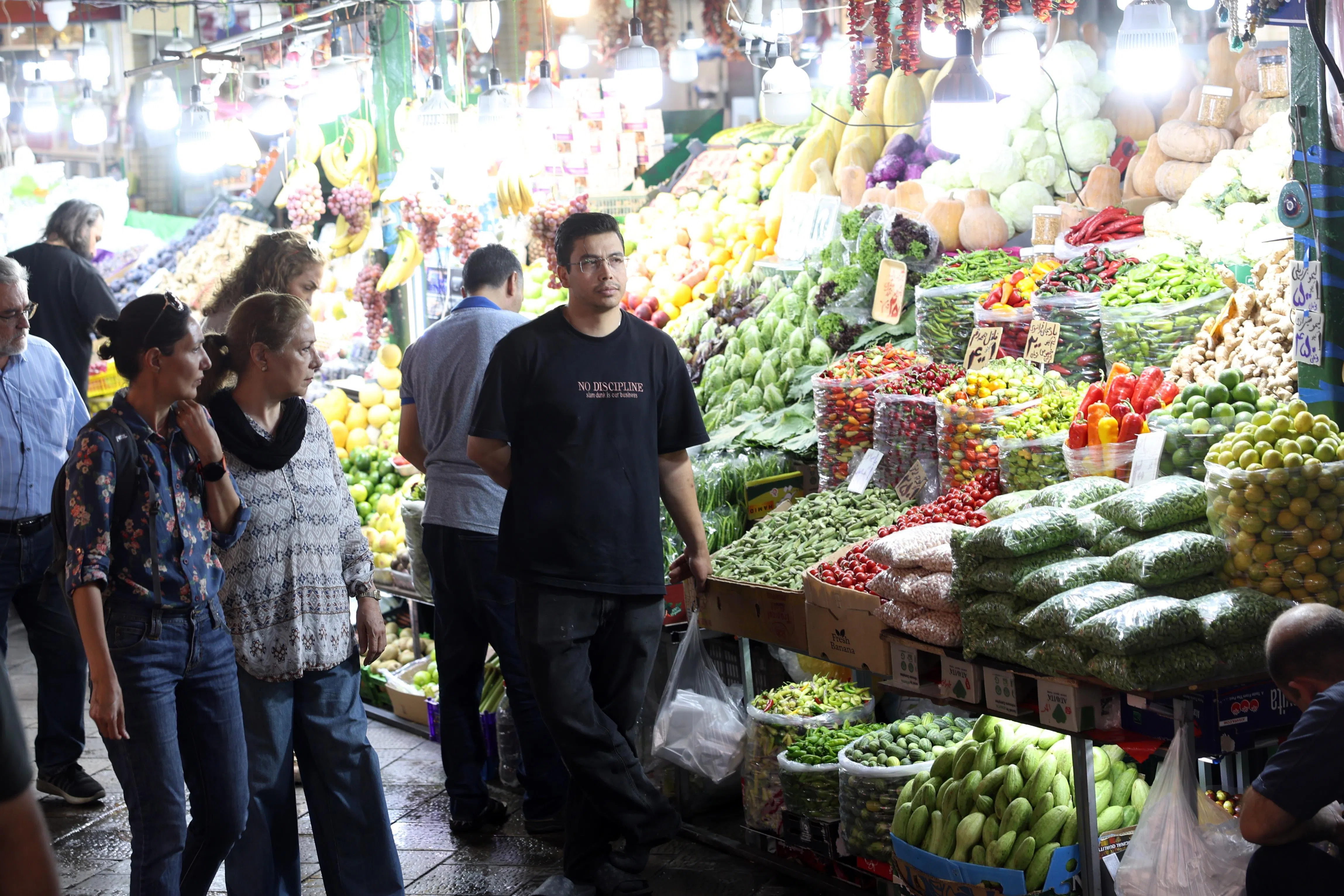 Iranians shopping at a bazaar in northern Tehran, Iran, on Aug 25. Food inflation reportedly hit 128 per cent year-on-year in July in Iran.