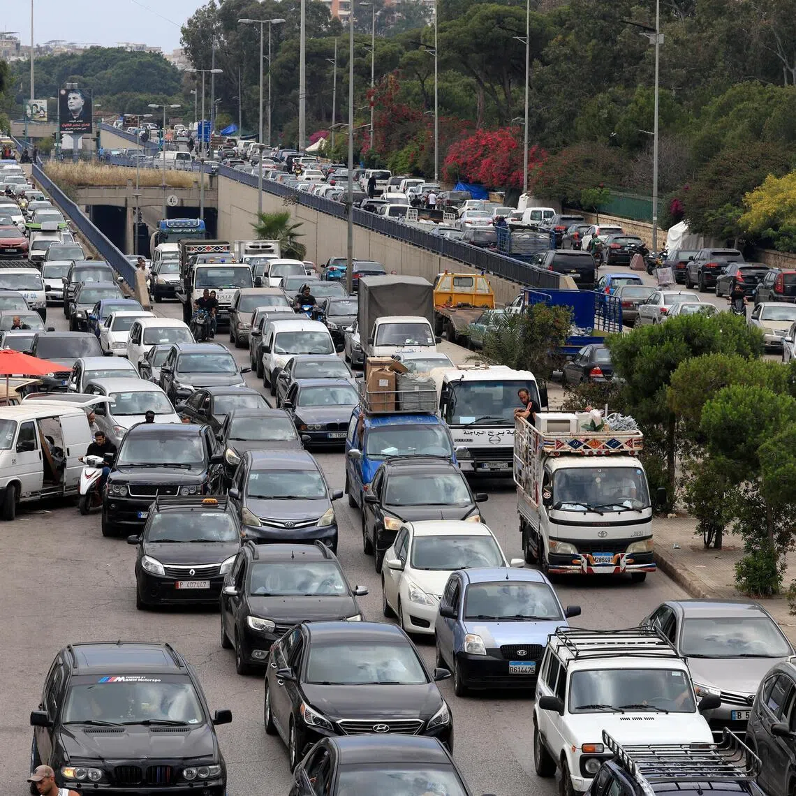 Residents fleeing the southern suburbs of Beirut on June 1 after Israeli Prime Minister Benjamin Netanyahu ordered the military to attack targets in the suburbs.