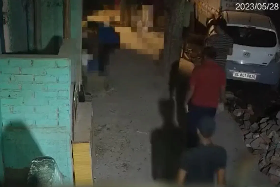 The man was seen in CCTV footage repeatedly stabbing her with a knife before hitting her head with a cement slab. 