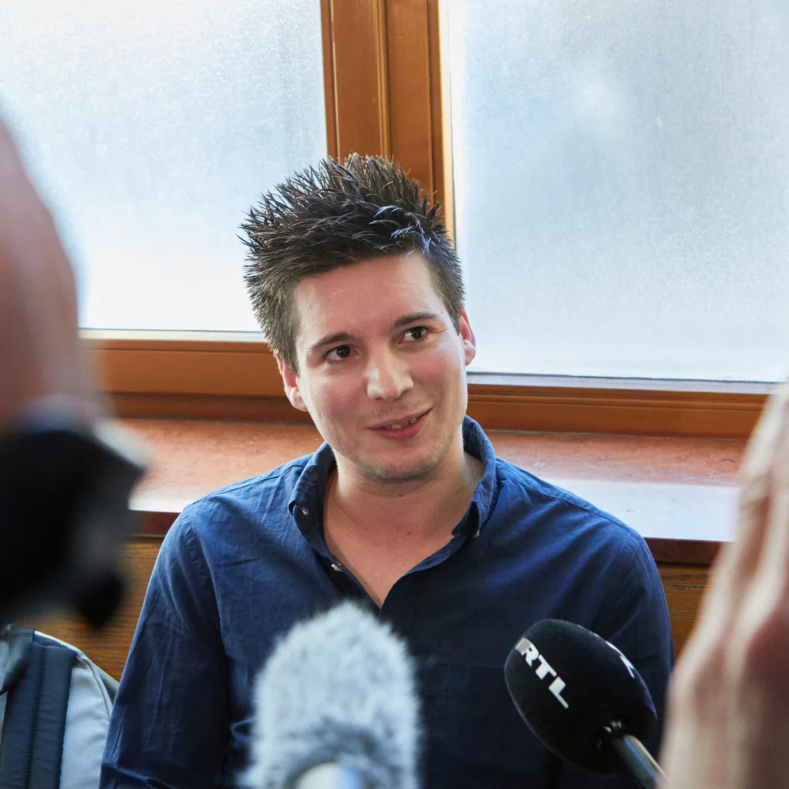 FILE PHOTO: Football Leaks whistleblower Rui Pinto talks to journalists at the Metropolitan Court in Budapest, Hungary, March 5, 2019. Picture taken March 5, 2019. Hatlaczki Balazs/Handout via REUTERS /File Photo