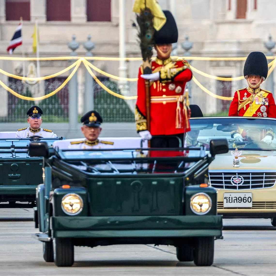 FILE PHOTO: Thailand's King Maha Vajiralongkorn and Queen Suthida review the guard of honour during a trooping of the colours ceremony to mark the 72nd birthday of Thailand's King Maha Vajiralongkorn in Bangkok, Thailand, December 3, 2024. REUTERS/Athit Perawongmetha/File Photo