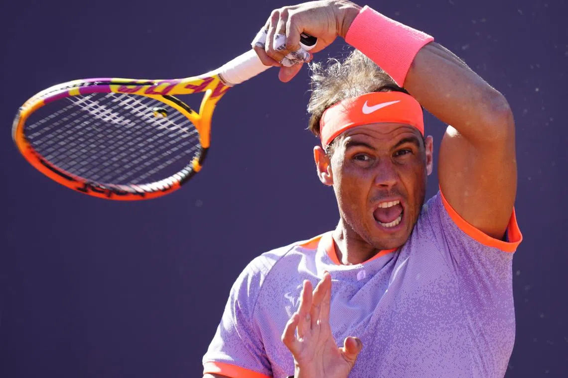 Spain's Rafael Nadal in action against Flavio Cobolli of Italy, in Barcelona.