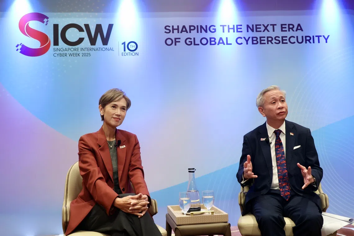 Digital Development and Information Minister Josephine Teo and Mr David Koh, CEO of the Cyber Security Agency of Singapore, speaking to the media on Oct 23.