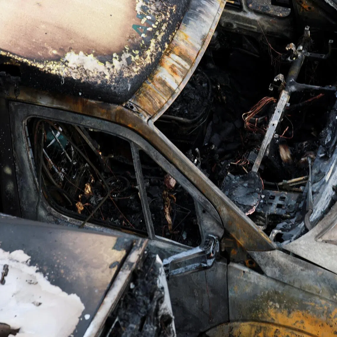 A burnt ambulance, among the four ambulances belonging to a Jewish community organisatio  that were set on fire in an incident that the police say is being treated as an anti-Semitic hate crime, in north-west London.