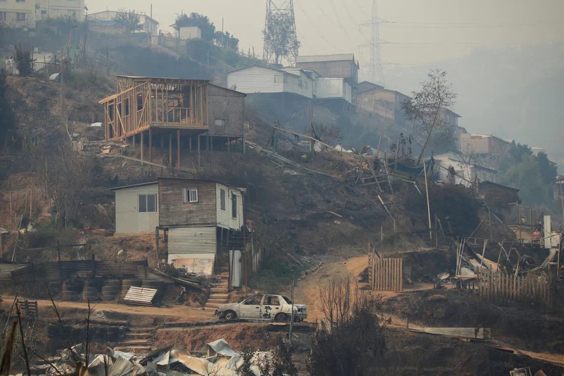 The remains of a burnt house are pictured following the spread of wildfires affecting many parts of the Valparaiso region, in Vina del Mar, Chile February 3, 2024. REUTERS/Sofia Yanjari/File photo