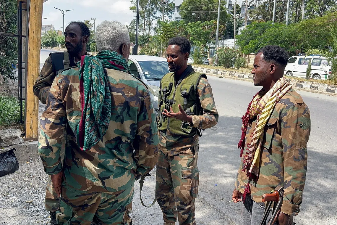 Members of the Ethiopian pro-government Tigray Peace Force (TPF) patrol after the Tigray People's Liberation Front (TPLF) army retreated from the regional capital Mekelle, Tigray Region, Ethiopia, October 6, 2026. Picture taken with a mobile phone. Obtained by REUTERS