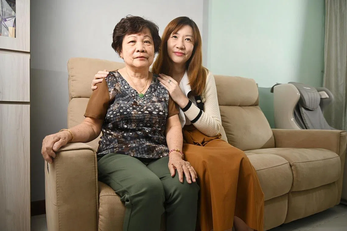 Ms Seline Cai pictured with her mother, Madam Chui Ah Loy, at their Woodlands HDB flat.