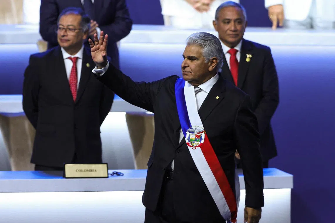 Panama's President Jose Raul Mulino gestures during his swearing-in ceremony as Colombia's President Gustavo Petro looks on, in Panama City, Panama, July 1, 2024. REUTERS/Aris Martinez