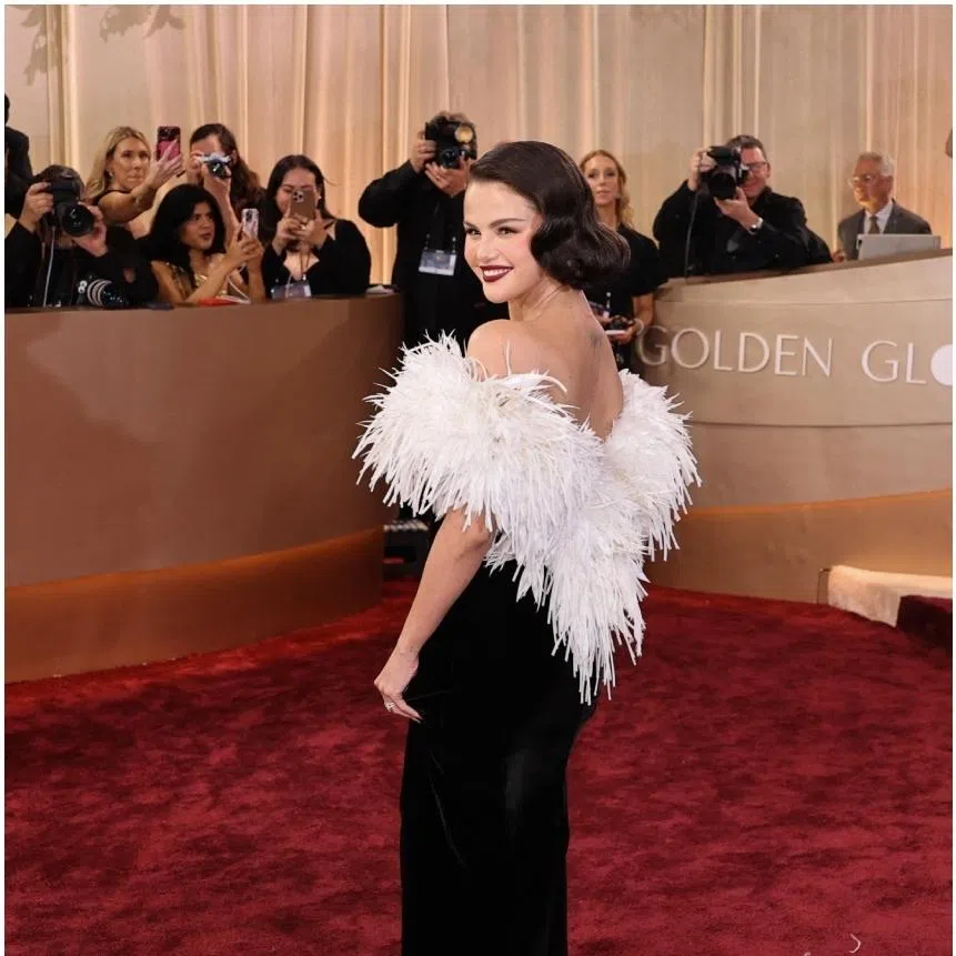 Selena Gomez (left) and Jennifer Lawrence on the red carpet at the 83rd Annual Golden Globes on Jan 11.