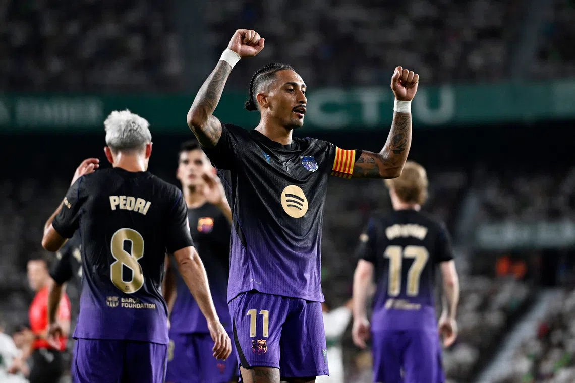 Soccer Football - LaLiga - Elche v FC Barcelona - Estadio Manuel Martinez Valero, Elche, Spain - August 23, 2026 FC Barcelona's Raphinha celebrates scoring their third goal REUTERS/Pablo Morano