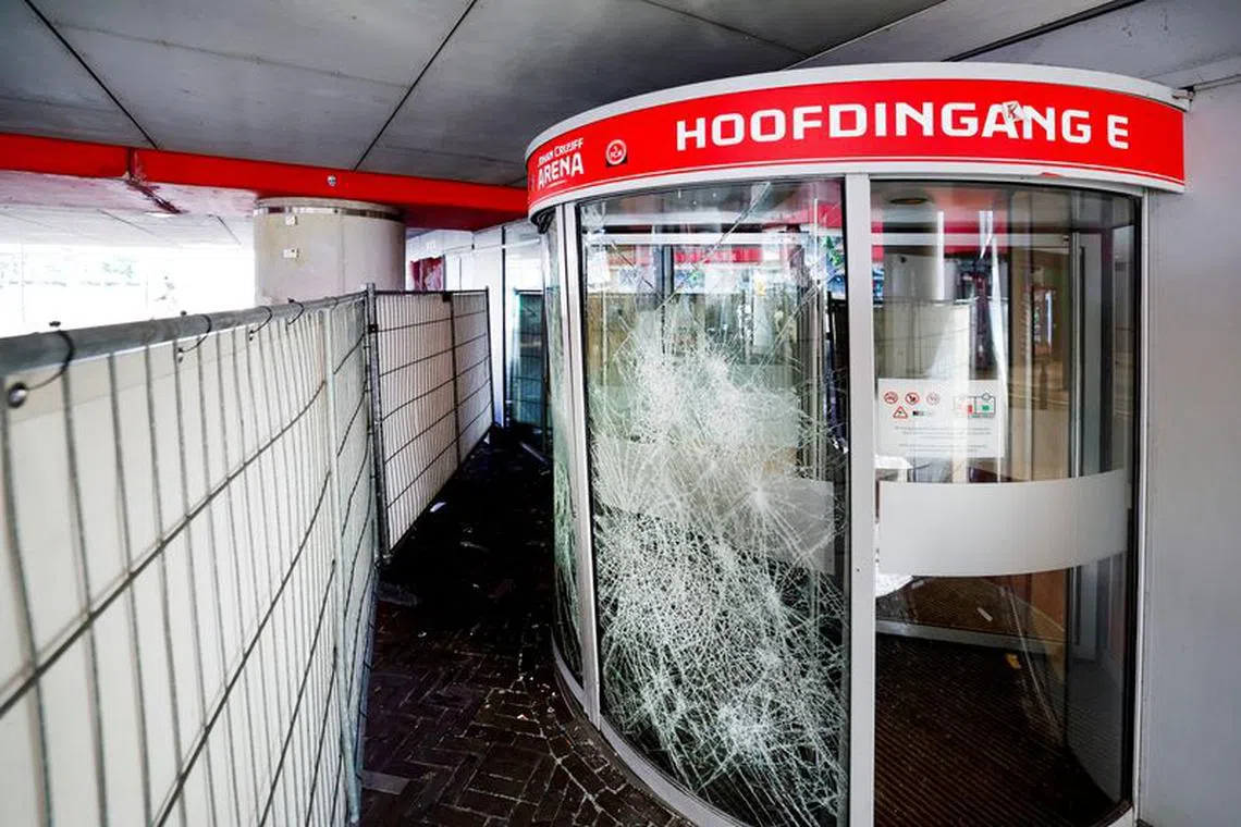 Destruction at the main entrance of Johan Cruijff Arena by the hooligans is seen after the abandoned match between Ajax and Feyenoord last Sunday in Amsterdam, Netherlands September 25, 2023. REUTERS/Piroschka van de Wouw