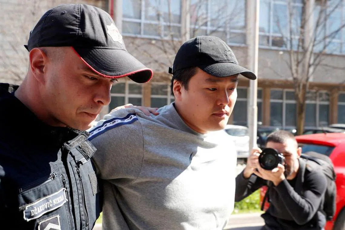 FILE PHOTO: Do Kwon, the cryptocurrency entrepreneur, who created the failed Terra (UST) stablecoin, is taken to court in Podgorica, Montenegro, March 24, 2023. REUTERS/Stevo Vasiljevic/File Photo