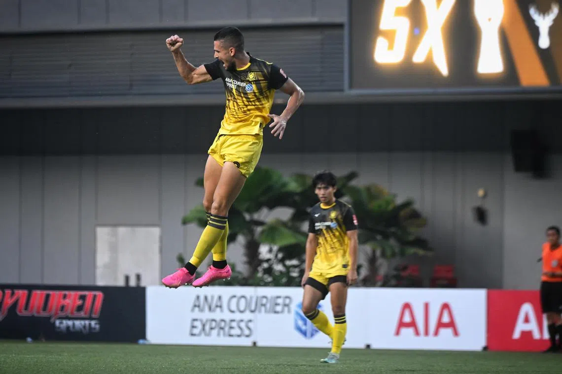 Boris Kopitovic, celebrates after scoring a goal for Tampines Rovers. 