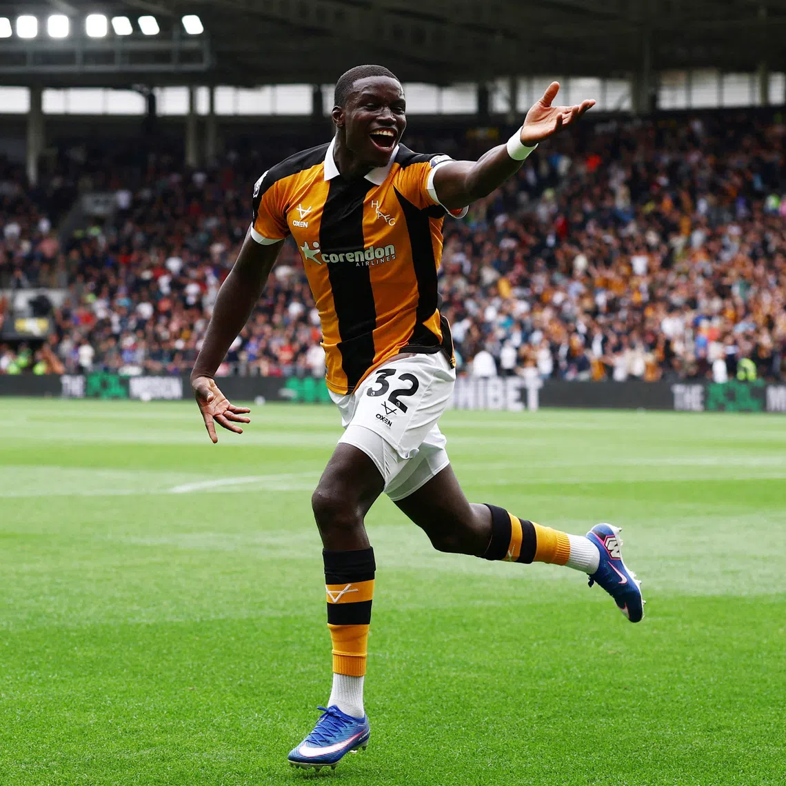 Hull City’s Nobel Mendy celebrates scoring their second goal against Manchester United on Aug 22.