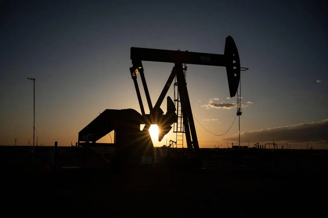 (FILES) Pump jacks operate near Loco Hills on April 23, 2020 in Eddy County, New Mexico, part of the Permian Basin. ExxonMobil sealed a megadeal to acquire Pioneer Natural Resources for about $60 billion, bolstering its holdings in the Permian Basin, a key US petroleum region, the companies announced on October 11, 2023. Under the all-stock transaction, ExxonMobil will buy Texas-based Pioneer for $59.5 billion based on ExxonMobil's closing price on October 5. The overall transaction, including debt, is valued at around $64.5 billion, the companies said. (Photo by Paul Ratje / AFP)