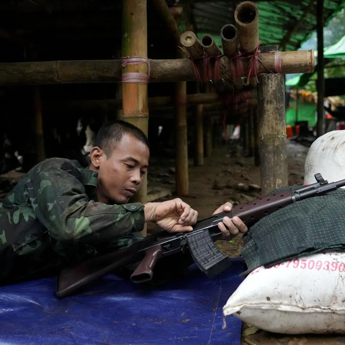 A new member of the People's Defence Force undergoing basic military training at a secret jungle camp in Mon State, Myanmar, on July 9.
