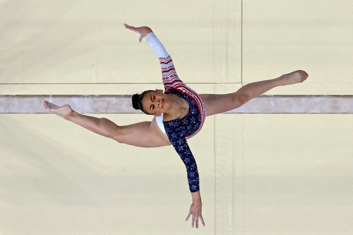 Paris 2024 Olympics - Artistic Gymnastics - Women's Team Final - Bercy Arena, Paris, France - July 30, 2024. Sunisa Lee of United States in action on the Balance Beam REUTERS/Athit Perawongmetha