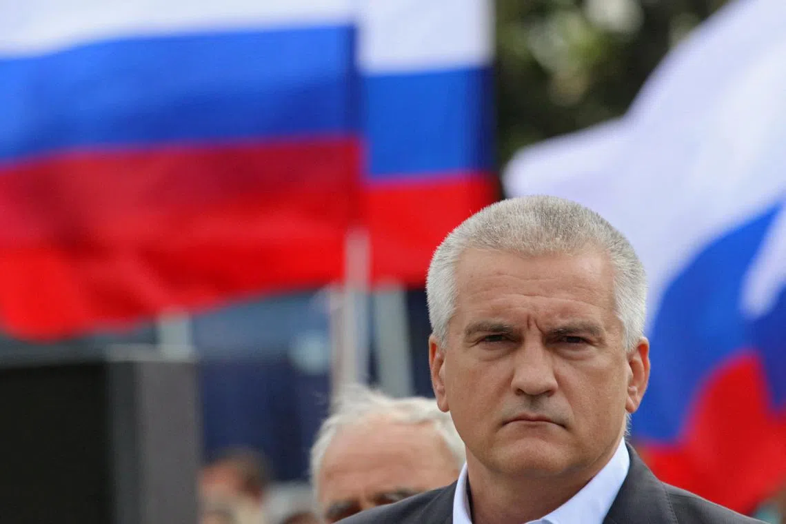 Russia's security service said it arrested a man who was recruited to blow up the car of Mr Sergei Aksyonov.