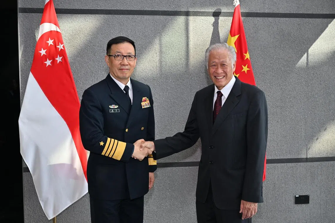 mychina 30 - China Minister of National Defense Admiral (ADM) Dong Jun (left) meeting Minister for Defence Dr Ng Eng Hen (right) earlier today.

Credit: MINDEF