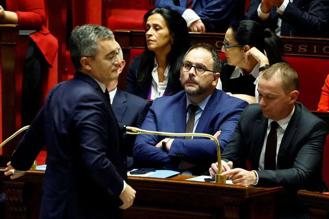 French Interior Minister Gerald Darmanin, Minister for Health and Prevention Aurelien Rousseau and Labour, Employment and Integration Minister Olivier Dussopt attend the questions to the government session at the National Assembly ahead of a vote by members of parliament on immigration bill in Paris, France, December 19, 2023.  REUTERS/Sarah Meyssonnier
