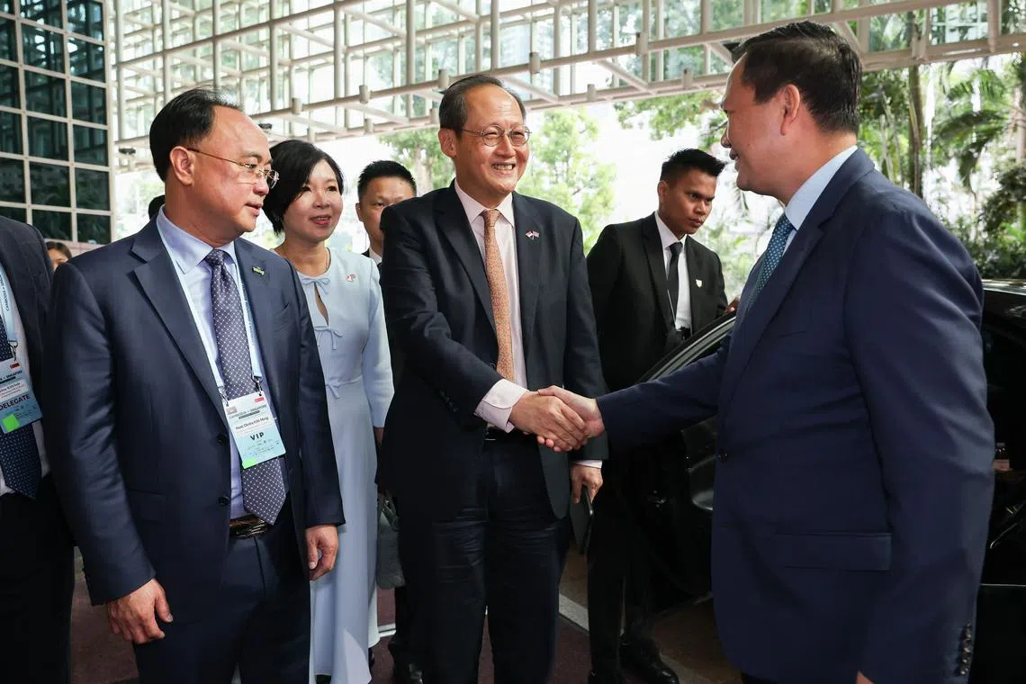 Second Minister for Trade and Industry and Manpower Minister Dr Tan See Leng (centre) receiving Cambodian PM Hun Manet for the Cambodia-Singapore Business Forum on June 19.