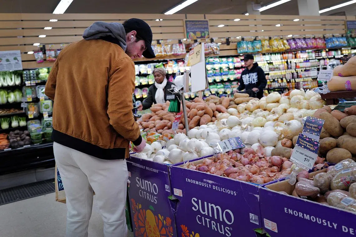 CHICAGO, ILLINOIS - FEBRUARY 13: Customers shop at a grocery store on February 13, 2024 in Chicago, Illinois. Grocery prices are up 0.4% from December and 1.2% over the last year, the slowest annual increase since June 2021.   Scott Olson/Getty Images/AFP (Photo by SCOTT OLSON / GETTY IMAGES NORTH AMERICA / Getty Images via AFP)