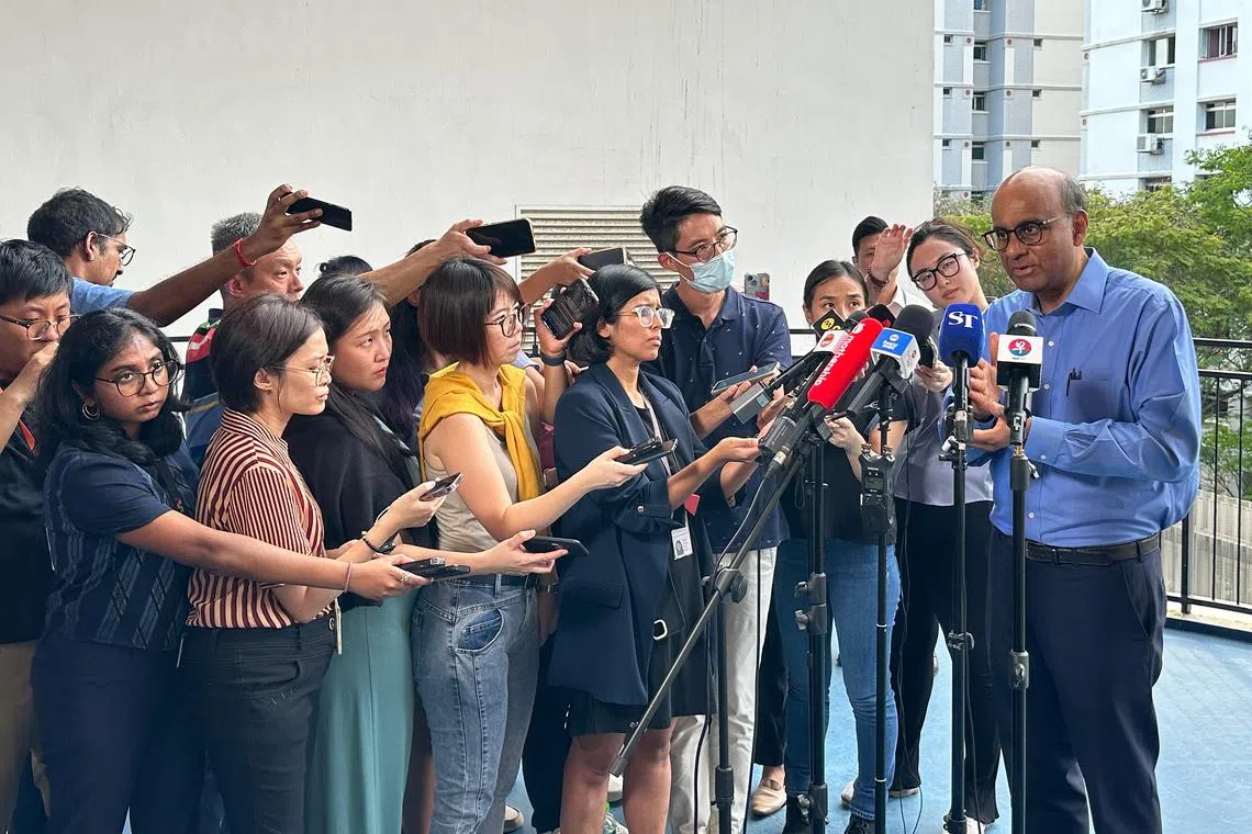 Senior Minister Tharman Shanmugaratnam speaking to media after announcing his candidacy in the upcoming presidential election on Thursday.
